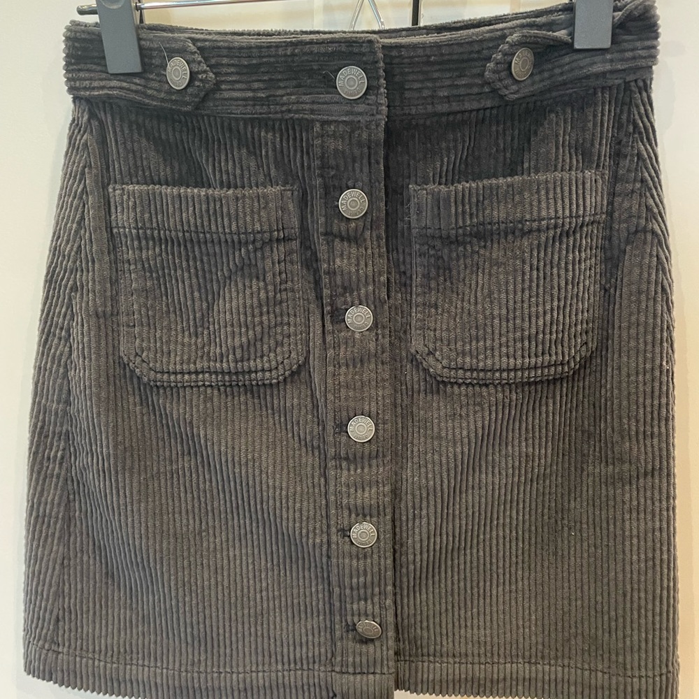 Madewell corduroy skirt with button detail and two front pockets; size 00